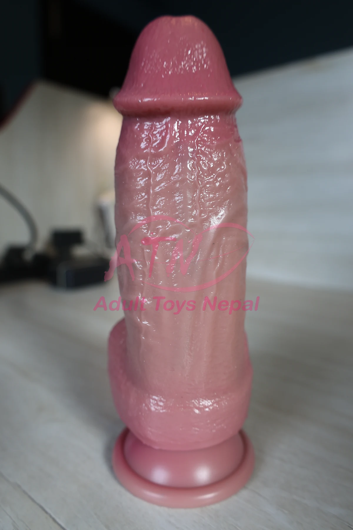 8.5 inch realistic dildo front view with defined head and textured shaft